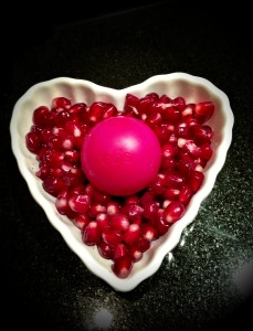 EOS raspberry & pomegranate lip salve.