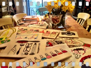 Emma's kitchen table full of her designs