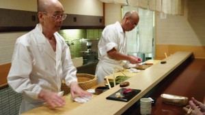 Jiro and his elder son prepare the sushi