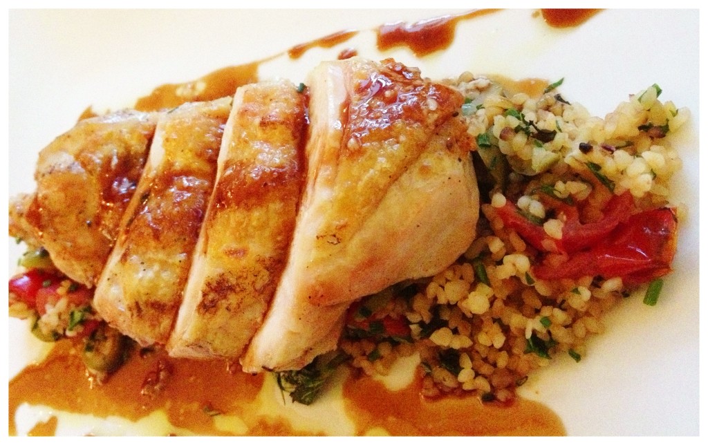 Nadra's cornfed chicken with green olives, cherry tomato, bulgur wheat with lemon and garlic dressing