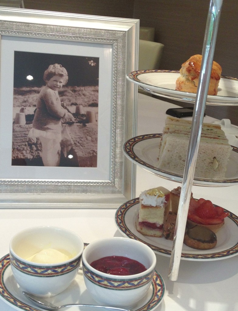 my Royal tea with a young Princess Elizabeth making sandcastles in the background