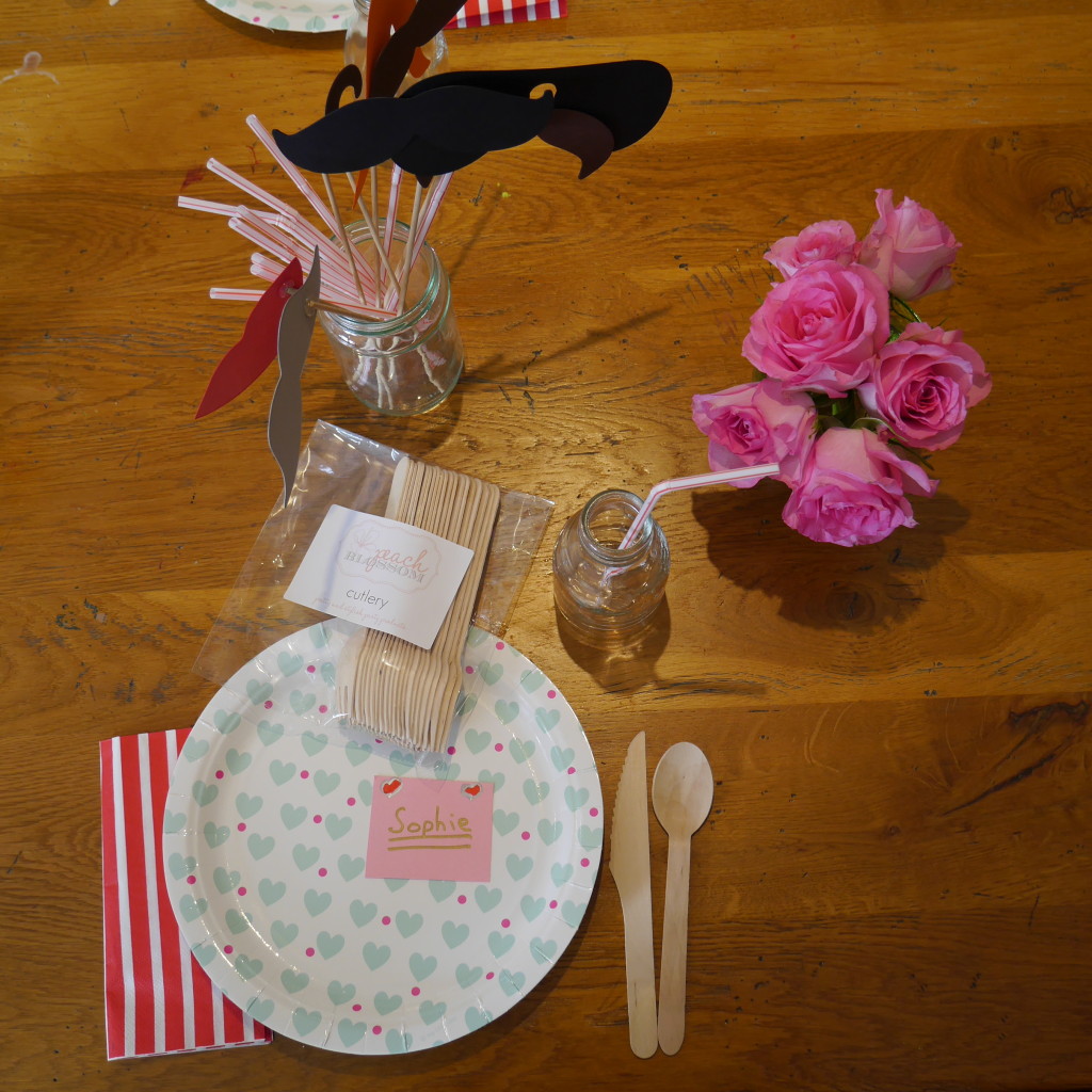 paper plates, wooden cutlery, mini milk bottles and some moustaches 