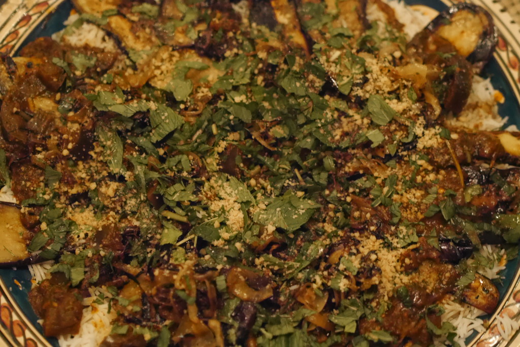 Mukloubi- bi lahmi - Braised aubergine layered rice with slow cooked lamb cooked in nutmeg, cinnamon & pomegranates molasses