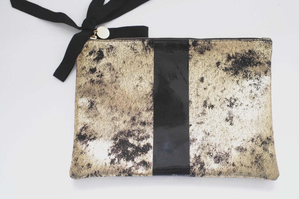 accessories with this Clare Vivier clutch