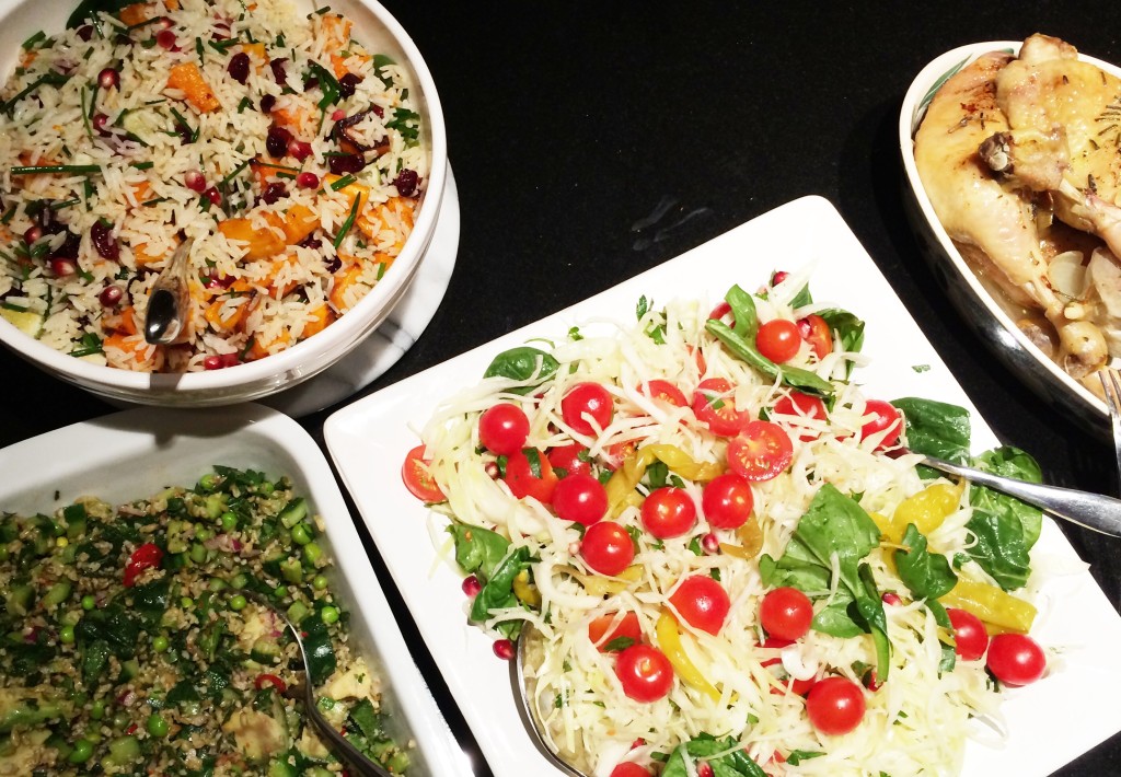 spring salad, jewelled rice salad and cabbage, tomato and pomegranate with my roast chicken pieces