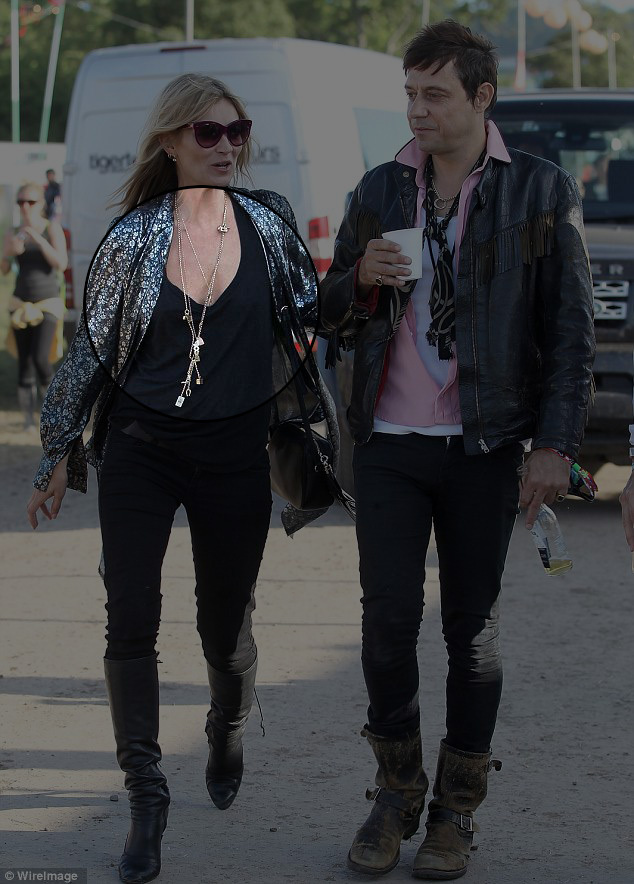 Kate Moss in Annina's charm necklace at Glastonbury last year