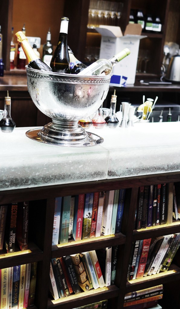 the bar is made of recycled glass bottles drunk at pre-opening Library parties...