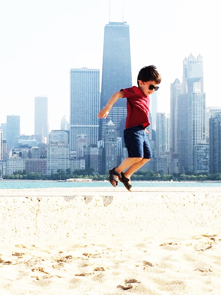 a run and a jump on the lakeside beach