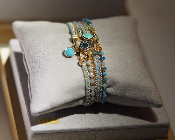 spot the #theirworld bracelet in this stack
