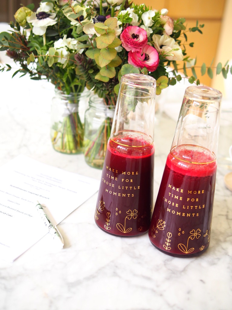beetroot, blood orange, apple and ginger juice prepared by Building Feasts for kikki.K and served in their glass water bottle